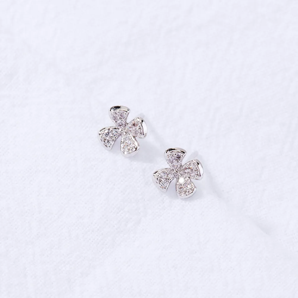 European and American cross-border hot selling earrings female trendy brand 4-petal flower zircon small earrings, small fresh sense of daily simple earrings
