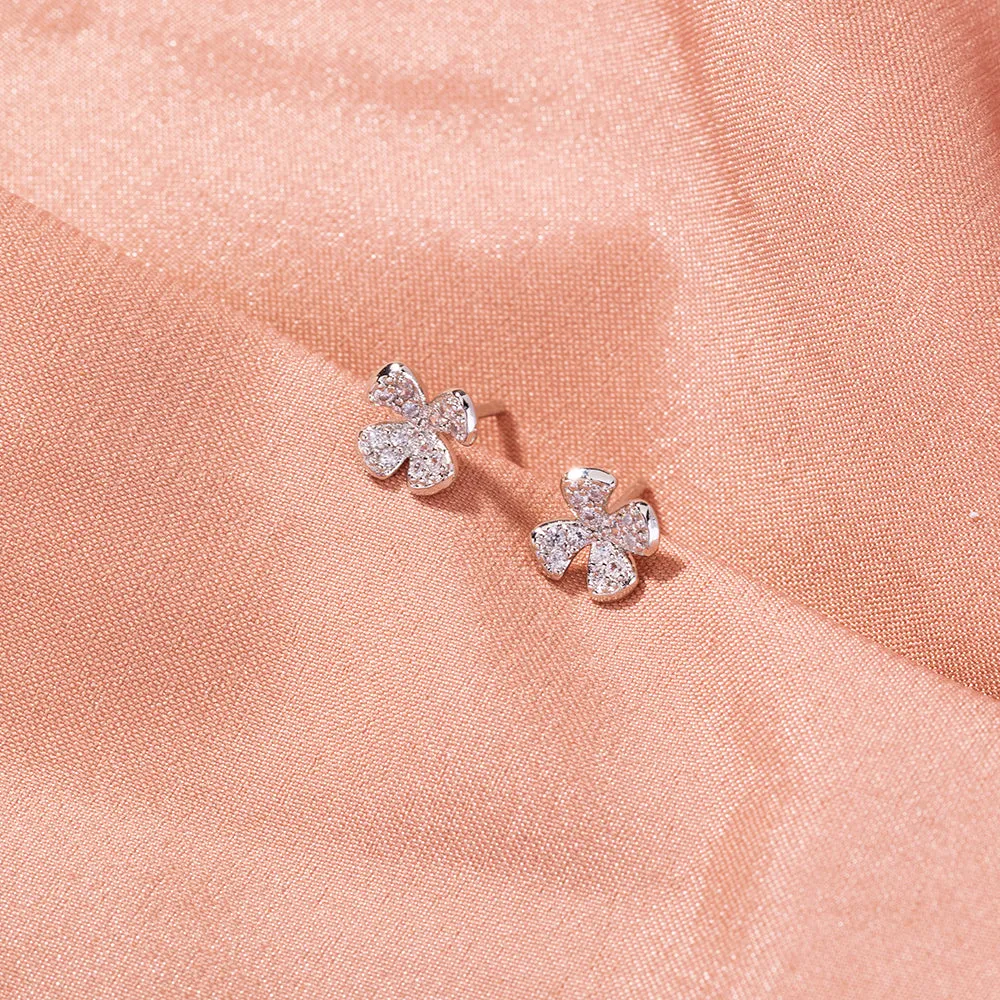 European and American cross-border hot selling earrings female trendy brand 4-petal flower zircon small earrings, small fresh sense of daily simple earrings