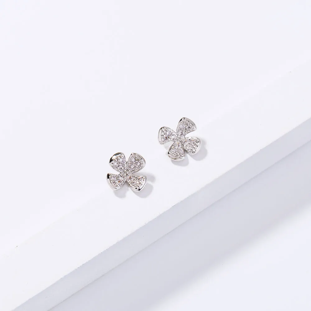 European and American cross-border hot selling earrings female trendy brand 4-petal flower zircon small earrings, small fresh sense of daily simple earrings