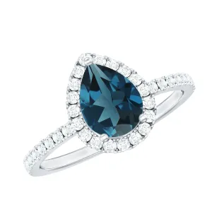 Pear Shape London Blue Topaz and Diamond Halo Ring